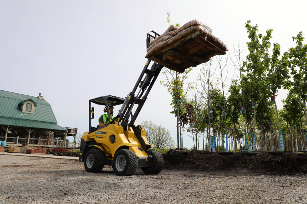 Vermeer ATX530 working on landscape